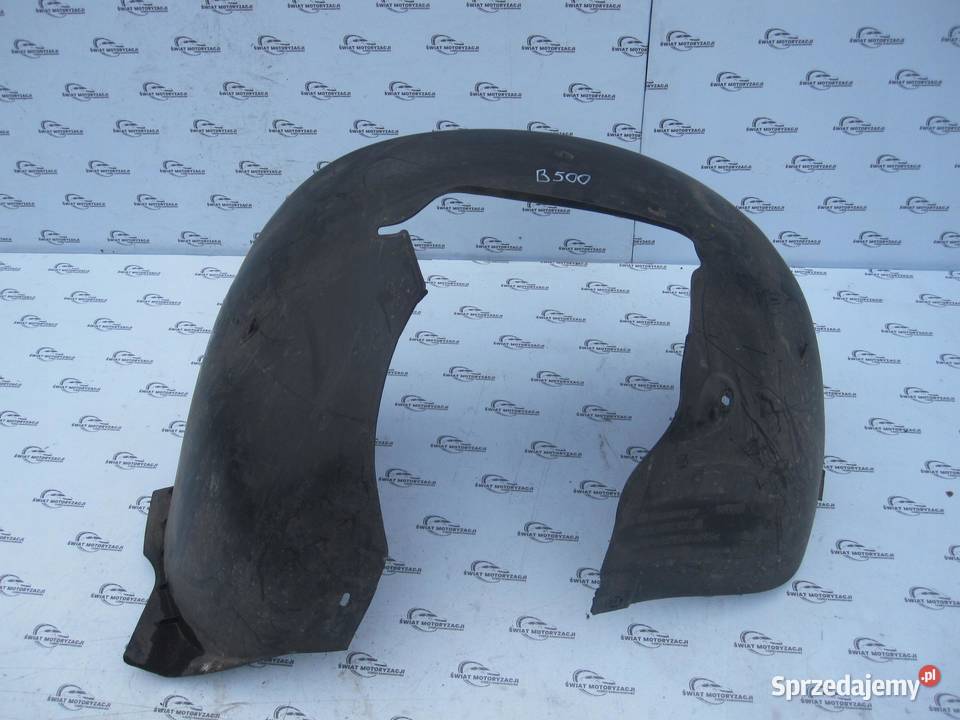 VW GOLF V 04r nadkole lewe przód 1K0805977B osobowe