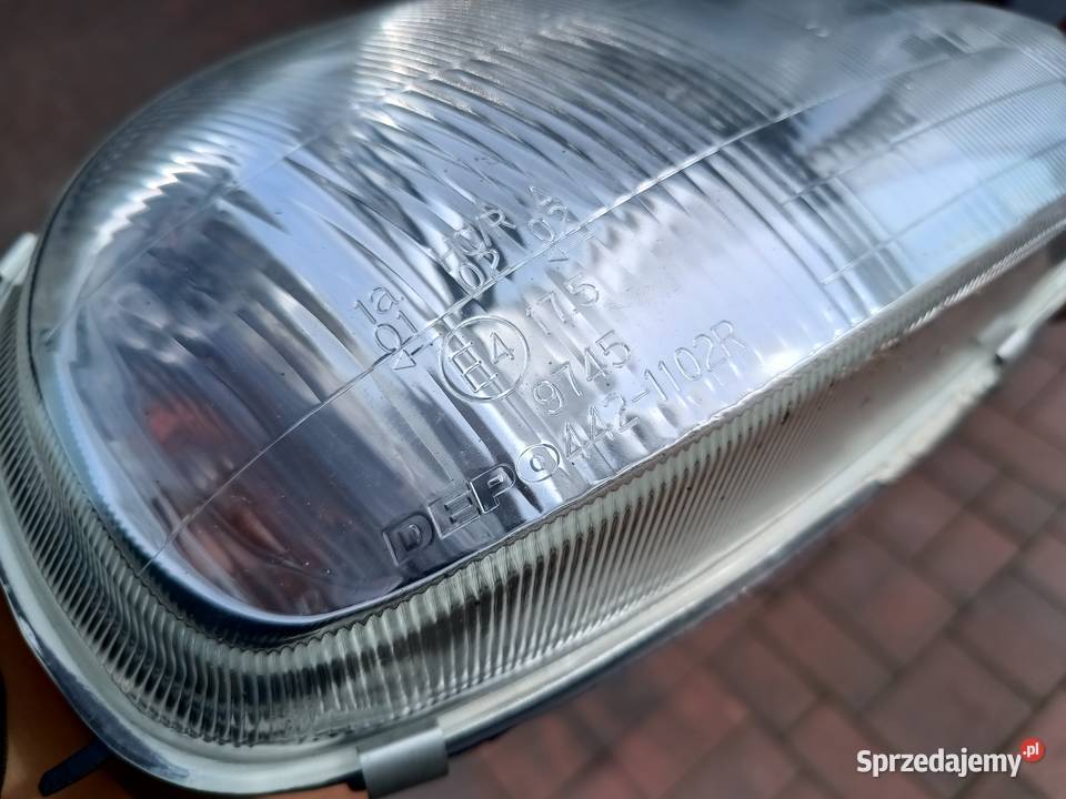 Reflektor prawy Opel Corsa B Depo Nowy lampa Witkowo