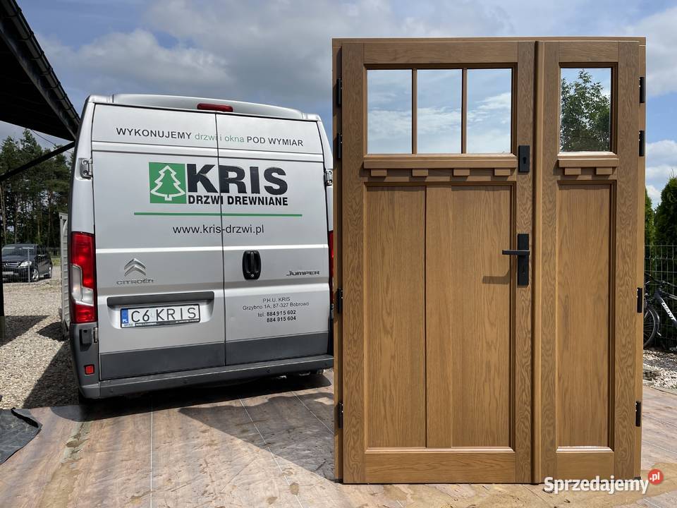 Drzwi zewnętrzne drewniane z doświetlami w Grzybno