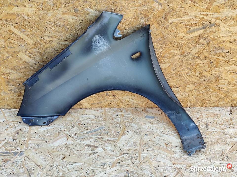 BŁOTNIK PRAWY PRZÓD PRZEDNI OPEL CORSA D 0611R Przemęt