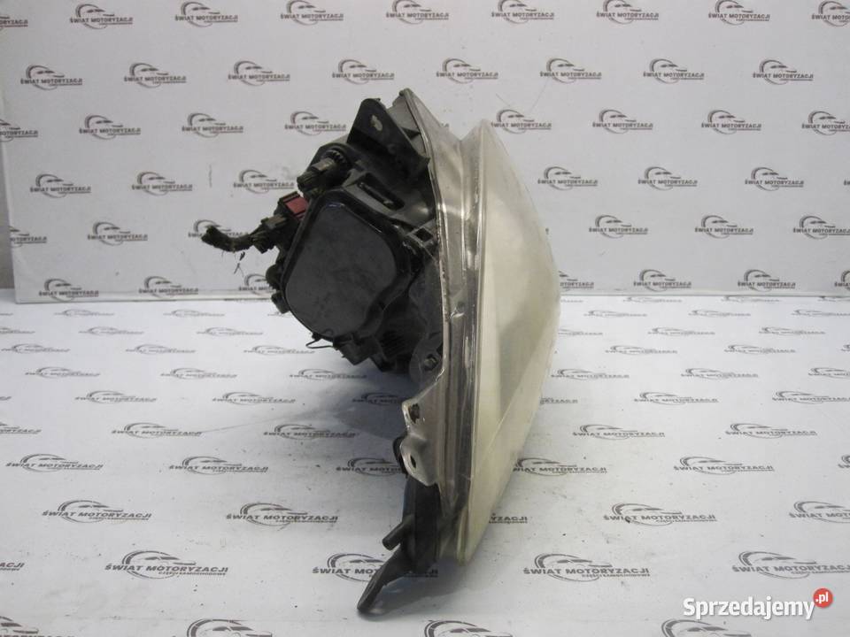 OPEL CORSA D lampa lewa przód 89391389 89391377