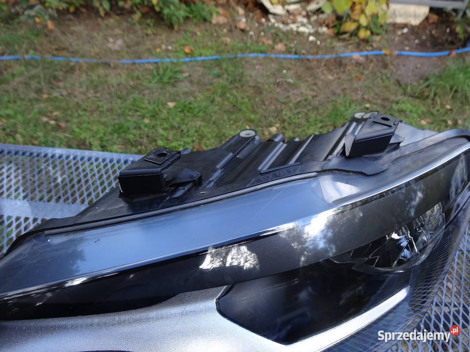 lampa lewa vw polo 6r hella 6r1941007e Lampy przednie Niemodlin