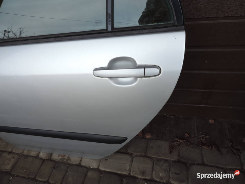 TOYOTA COROLLA E12 SEDAN DRZWI LEWY TYŁ 199 małopolskie
