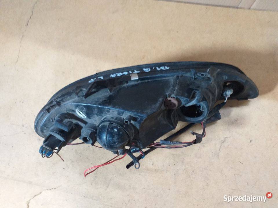 131G OPEL TIGRA Reflektor Lampa przednia lewa Włoszczowa