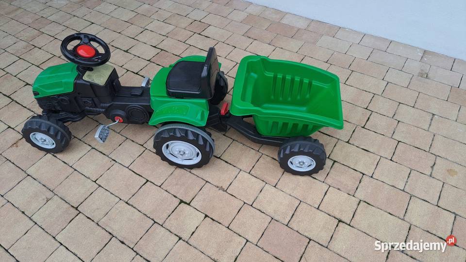 Traktorek na pedały z przyczepką dziecka ładny