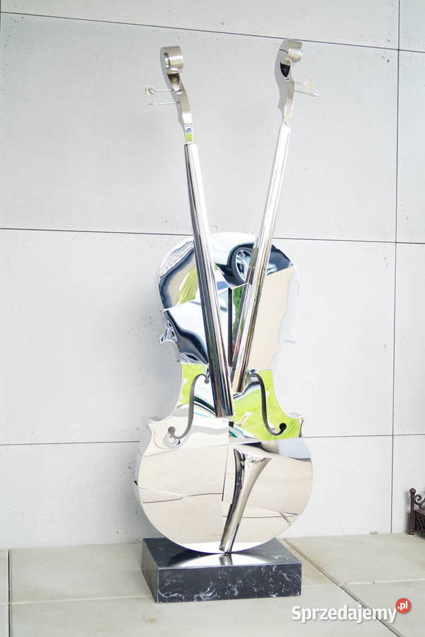 Srebrne skrzypce stal nierdzewna na marmurze Gizałki