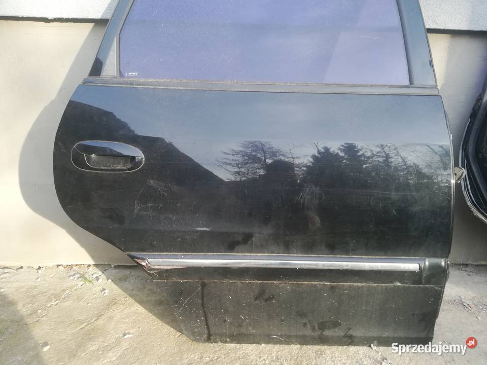 Kia carens ii 2 drzwi prawe lewe tył tylne