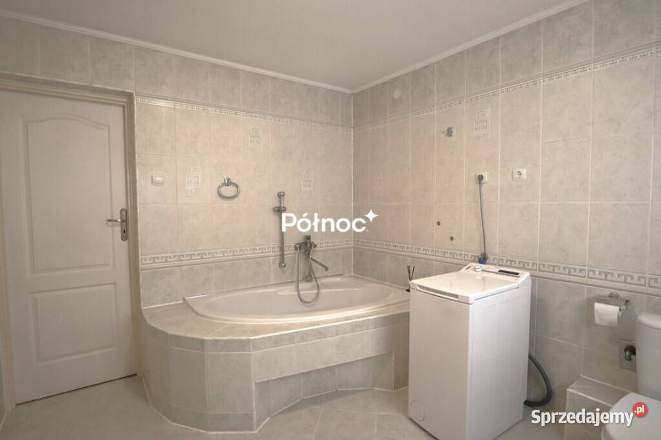 Dom z ogrodem tarasem i garażem