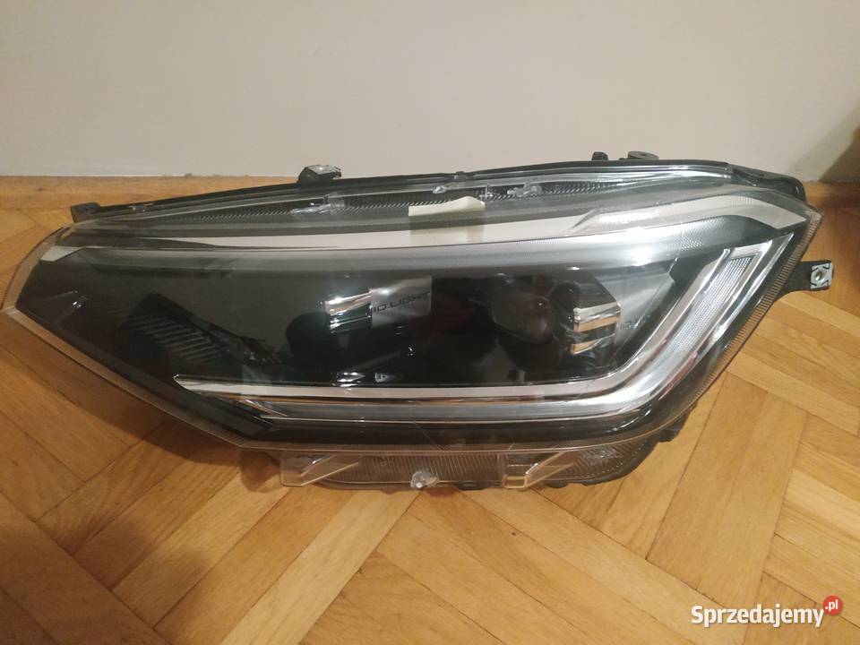 Reflektor lewy lampa lewa przód przednia VW Warszawa