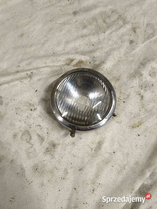 Odbłyśnik z ramką przedniej lampy Romet Przasnysz