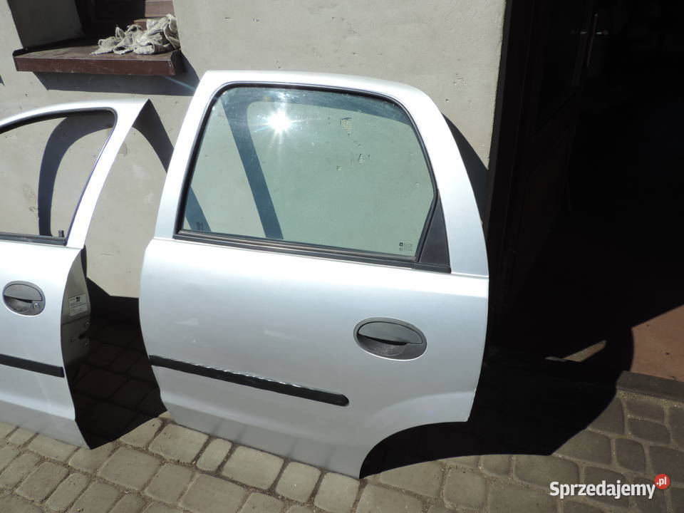 DRZWI LEWY TYŁ OPEL CORSA C 5D Z147 osobowe Nowy Sącz