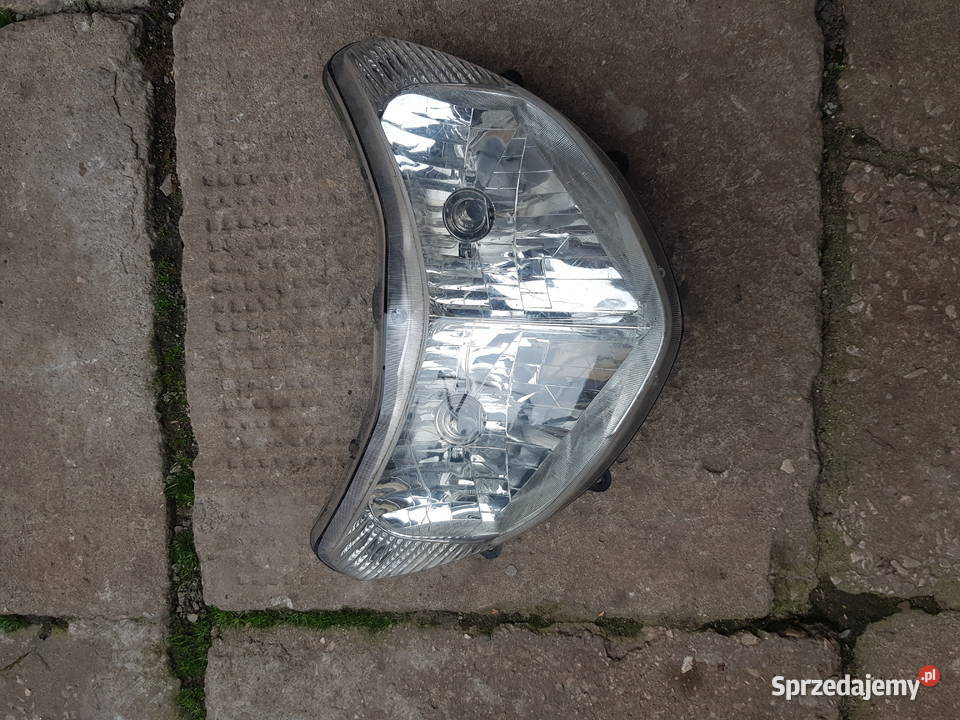 SUZUKI BURGMAN 125 0106 REFLEKTOR LAMPA PRZEDNIA Jędrzejów