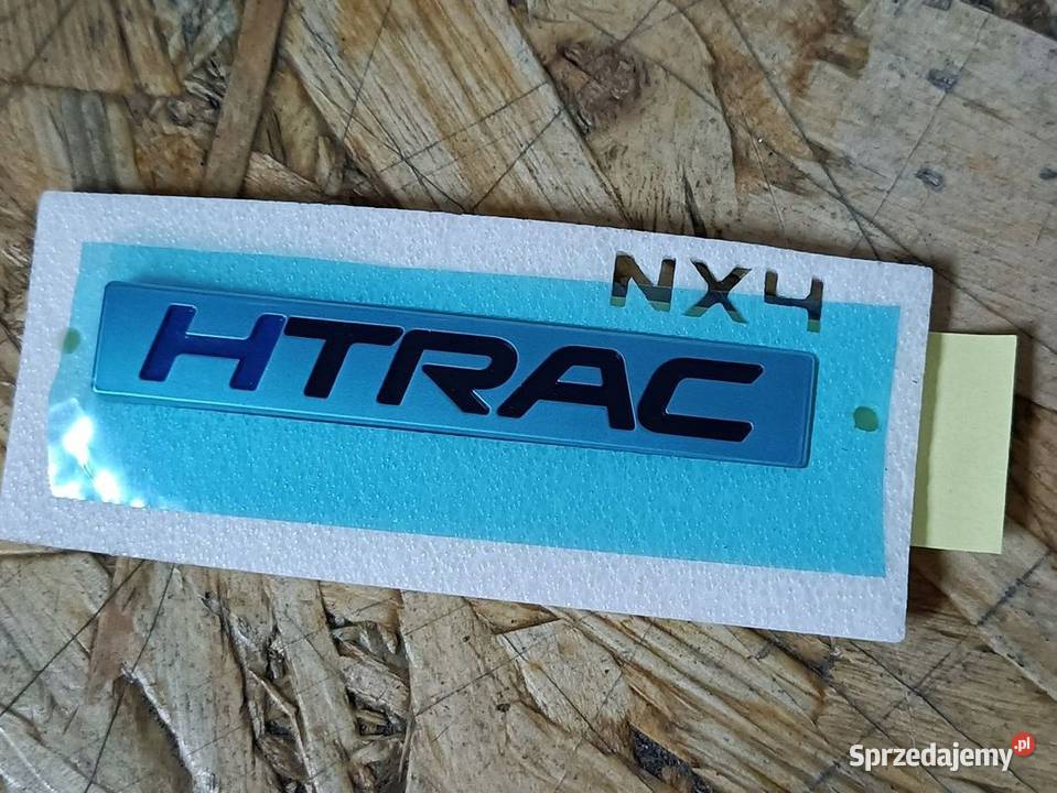 HYUNDAI TUCSON NX4 MK4 22 EMBLEMAT BAGAŻNIKA wielkopolskie