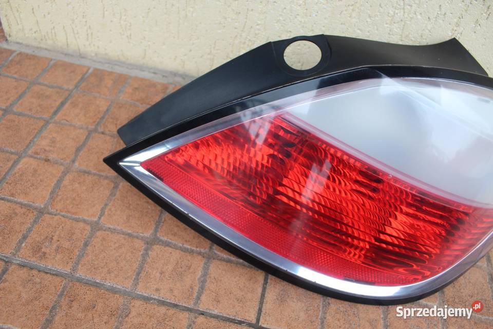 LAMPA PRAWY TYŁ TYLNA OPEL ASTRA H 24451837