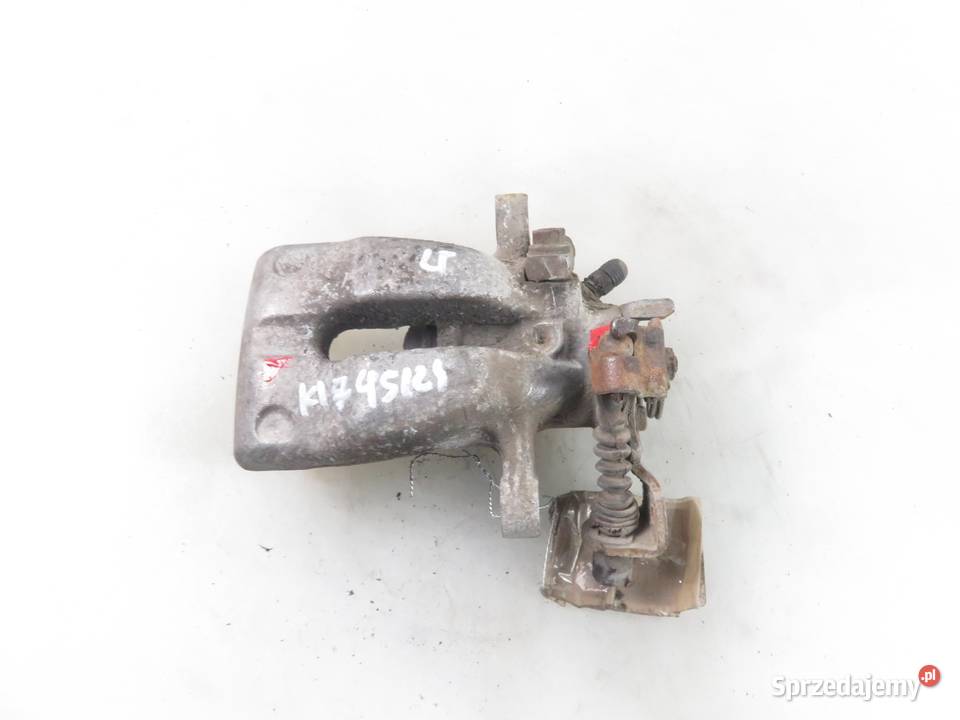 ZACISK LEWY TYŁ OPEL ASTRA III H 17 CDTI Zaciski i jarzma małopolskie