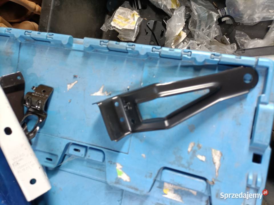 VW POLO MOCOWANIE BŁOTNIKA LEWY PRZÓD 6Q0810679E części blacharskie Luzino