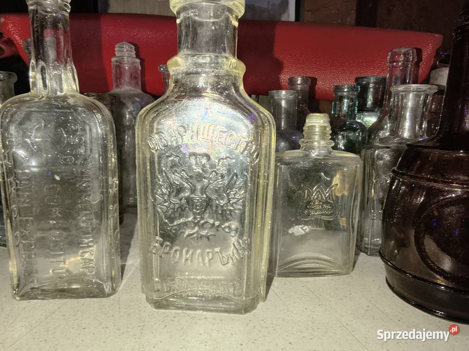 23 sztuki sygnowanych buteleczek Antyki Suwałki