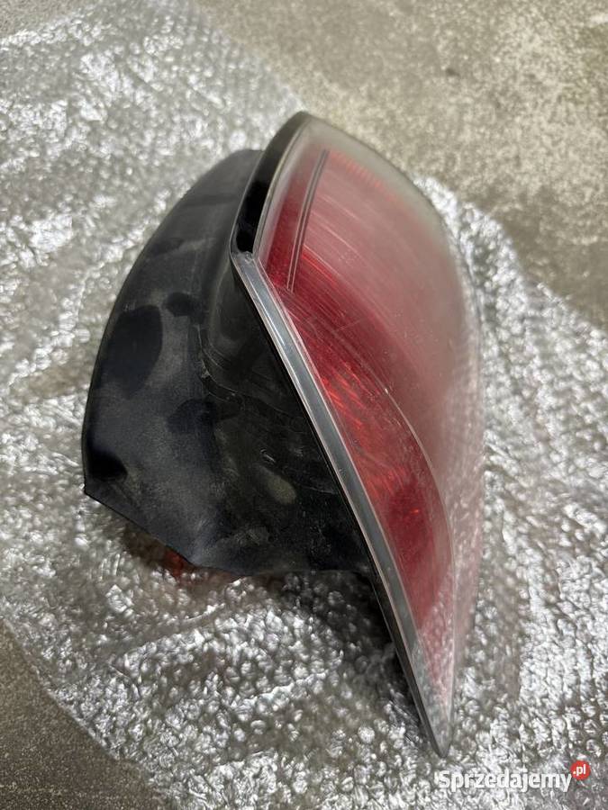 Lampa tył Astra H kombi lewe