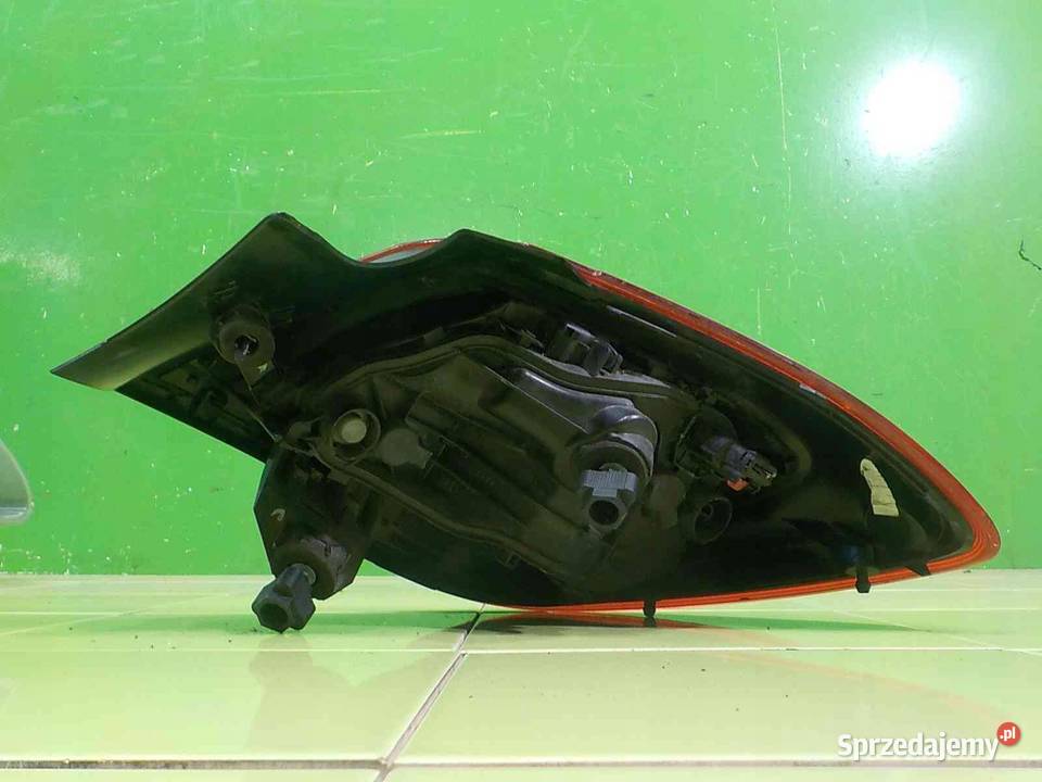 OPEL CORSA E 12 B 15r 3D lampa lewa tyl 13428455 osobowe Suków