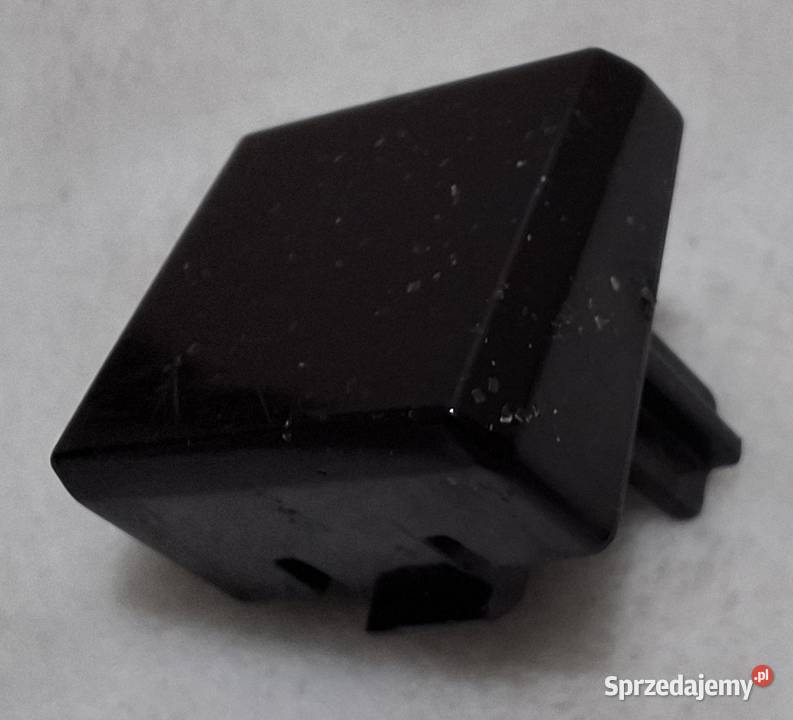 Przycisk zwalniania blokady dokowania wałka Czeladź