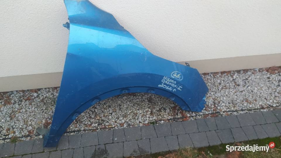 Błotnik przedni prawy Qashqai j11 lift Słupca