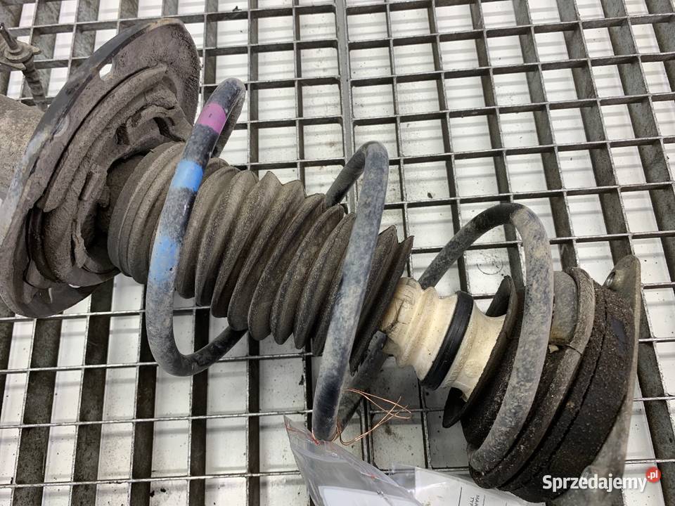 AMORTYZATOR LEWY PRZÓD ZE SPRĘŻYNĄ RENAULT podkarpackie