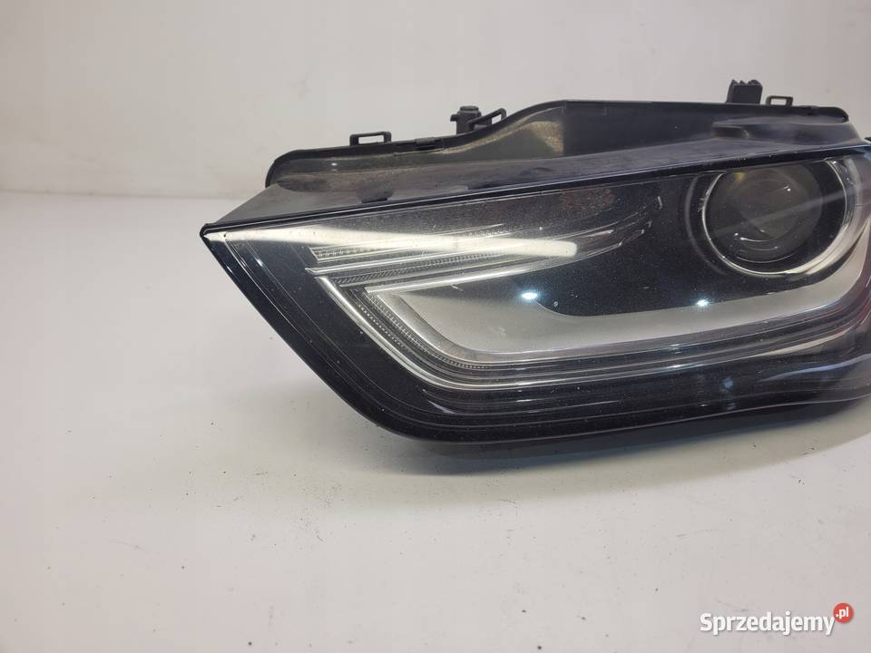 REFLEKTOR LEWY PRZÓD AUDI A4 B8 LIFT UK osobowe śląskie