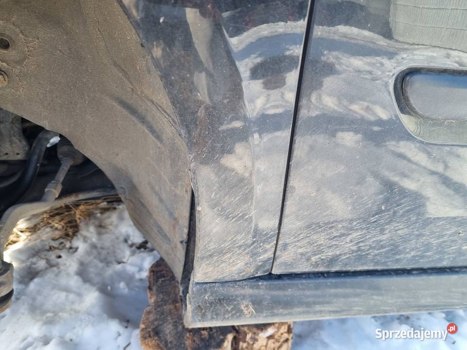 RENAULT LAGUNA 3 III 0715 KOMBI BŁOTNIK LEWY Kolbuszowa