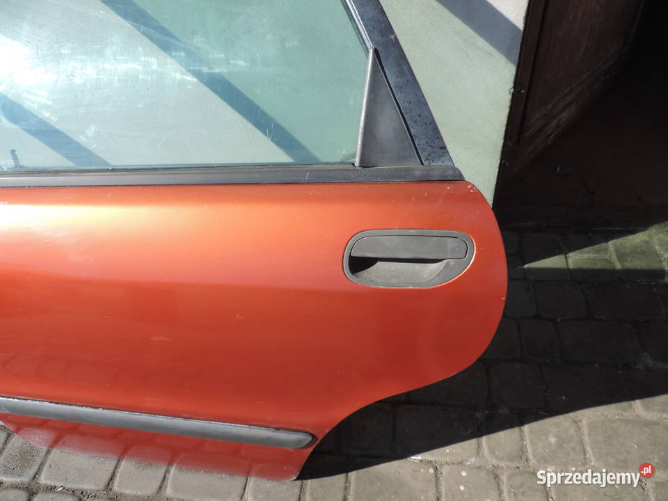 VOLVO V40 I FL DRZWI LEWE TYLNE TYŁ 33822 Nowy Sącz