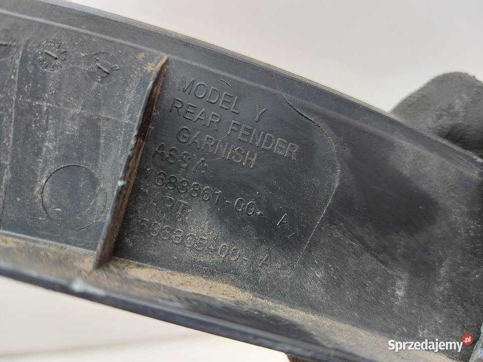 TESLA MODEL Y 2022r LISTWA BŁOTNIKA LEWY TYŁ osobowe