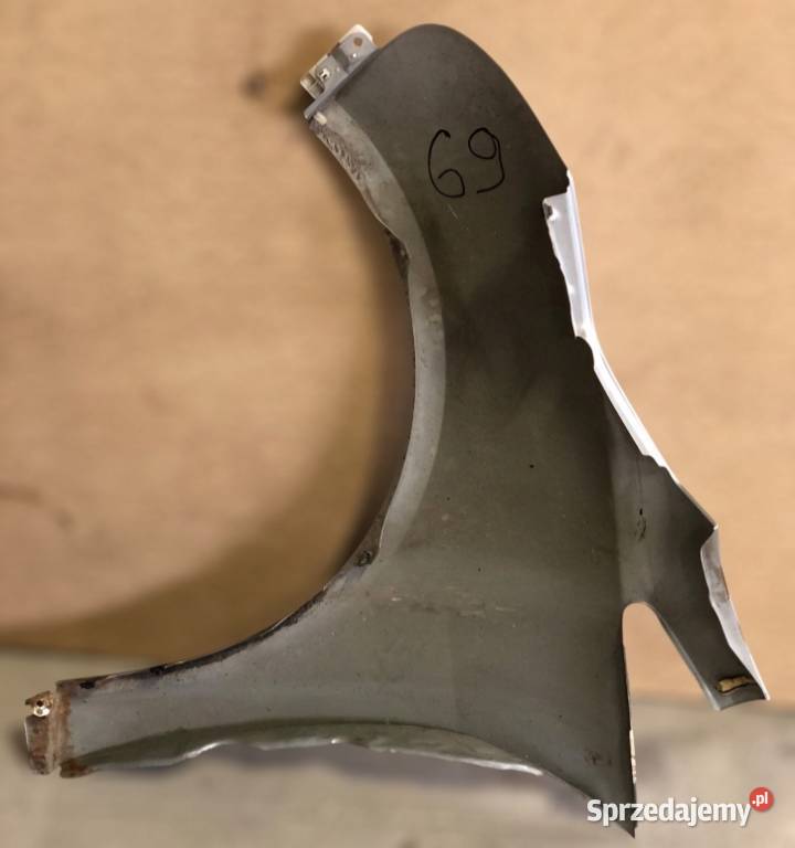 BŁOTNIK PRZEDNI PRAWY MITSUBISHI GRANDIS osobowe Skołoszów