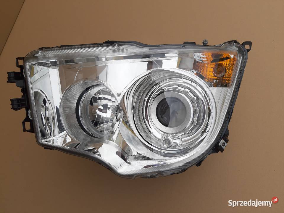 AROCS ANTOS REFLEKTOR LEWY XENON NOWY ORYGINAŁ ciężarowe