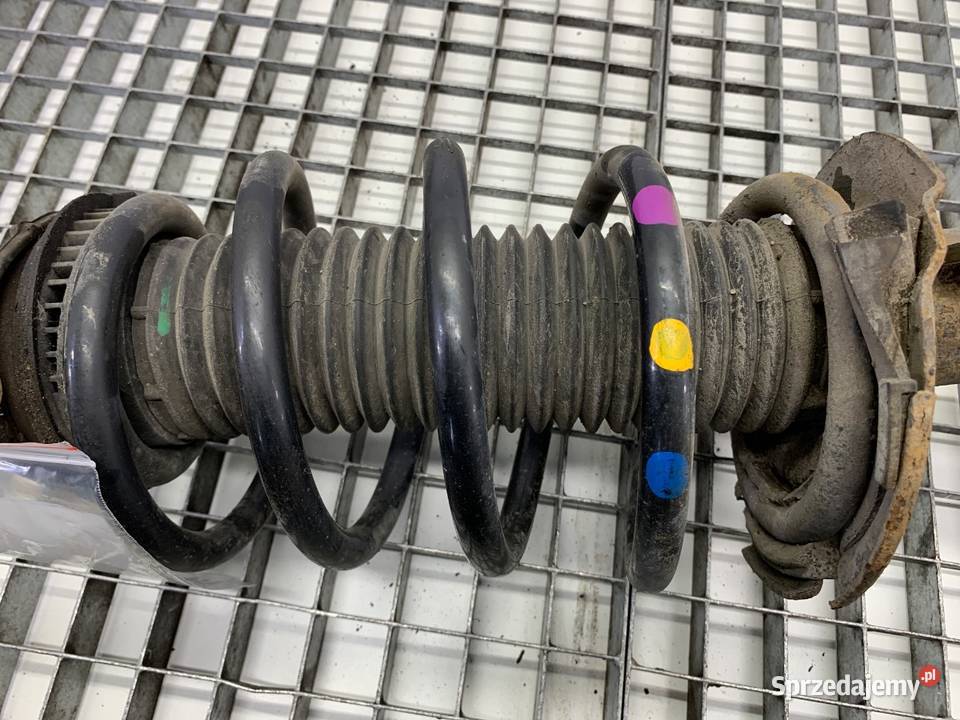 AMORTYZATOR LEWY PRZÓD ZE SPRĘŻYNĄ FORD TRANSIT osobowe