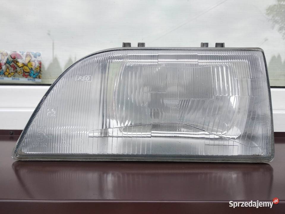 Polonez Caro lampa przednia lewa reflektor przód Lampy przednie Sieradz