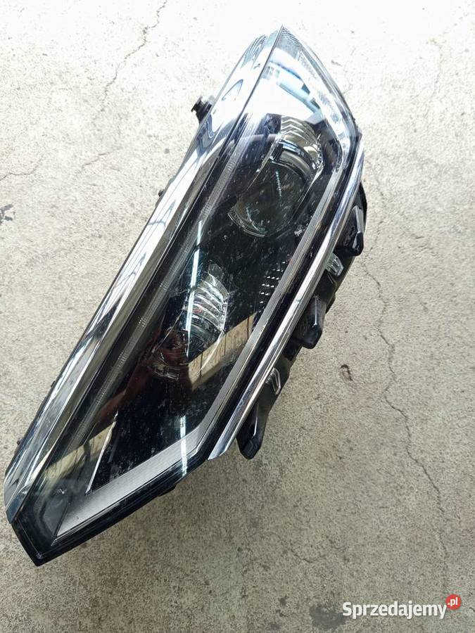 Reflektor lewy passat b8 matrix orginal osobowe Rzeszów