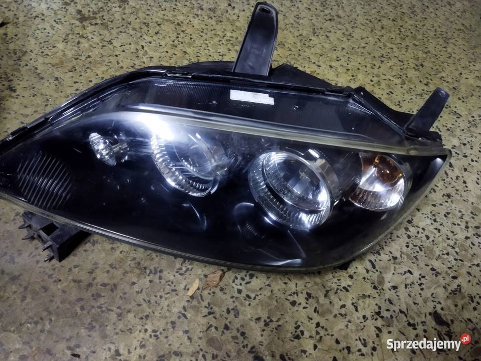 mazda 2 lift zatyczki lampy przedniej Rok produkcji 2006