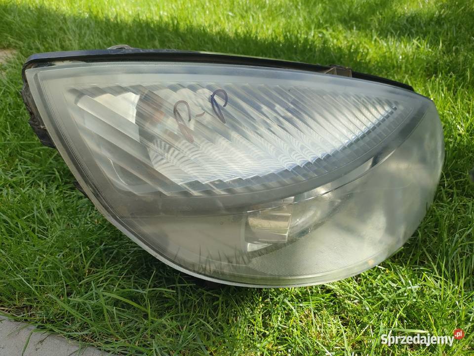 Scenic II lampa lewy prawy przód XENON osobowe Swarzędz
