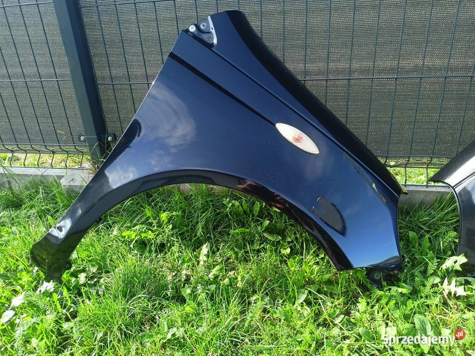 Błotnik prawy lewy Toyota Yaris P1 9905 kod