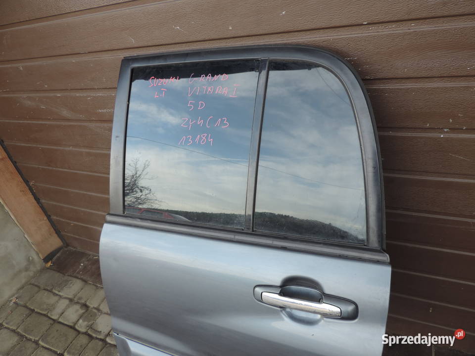 SUZUKI GRAND VITARA 1 5D DRZWI LEWY TYŁ ZY4C13