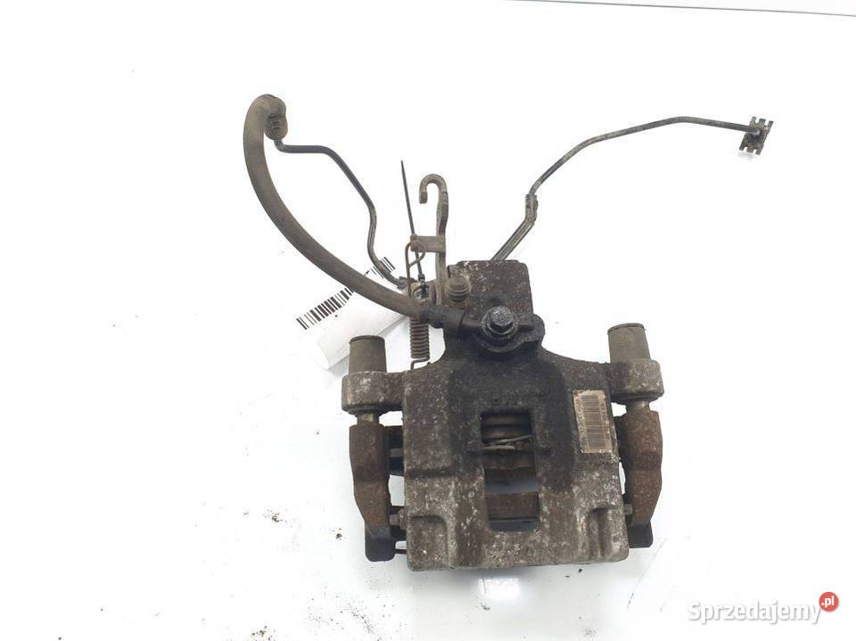 ZACISK HAMULCOWY TYŁ LEWY PEUGEOT 308 967074058A osobowe Motoryzacja Lipno