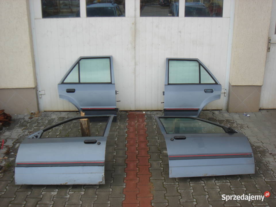 FORD ESCORT IV drzwi przód tył lewe prawe Nowy Dwór Gdański