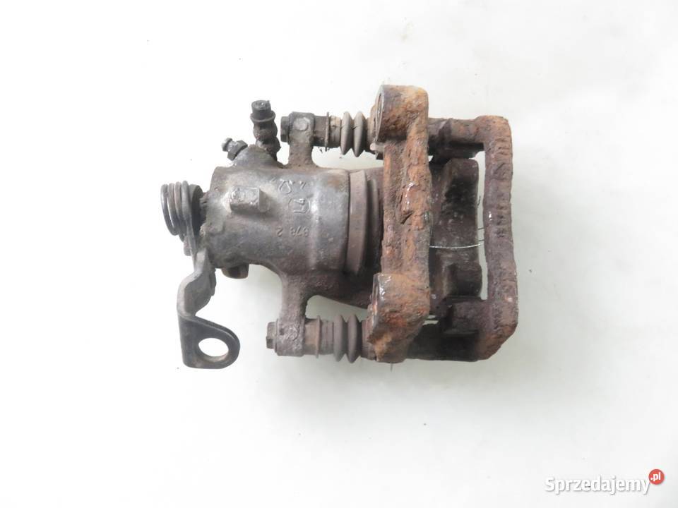 ZACISK LEWY TYŁ OPEL ASTRA III H GTC osobowe sprzedam