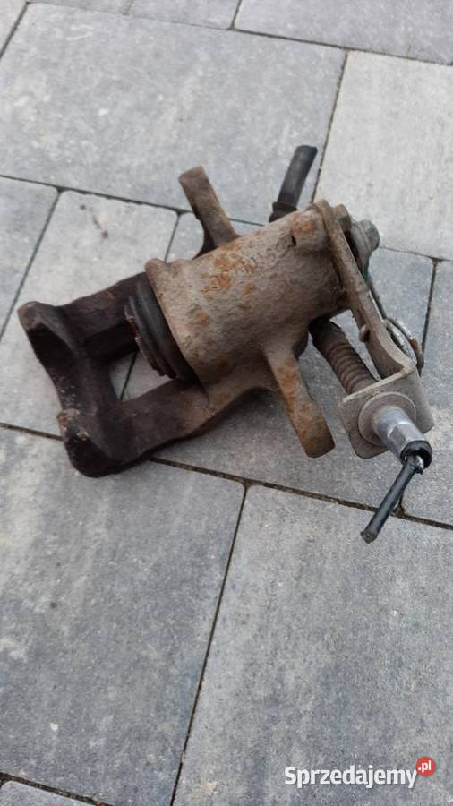 Zacisk hamulcowy lewy tył Kia Rio III Hyundai Świdnik