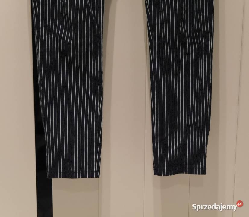 Reserved świetne spodnie w paseczki pasek 34 XS Rozmiar 34(XS)