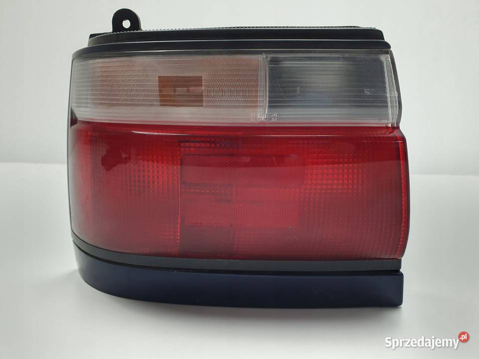 Toyota Corolla E10 E100 VII 9297r TYLNA LAMPA osobowe Rudka