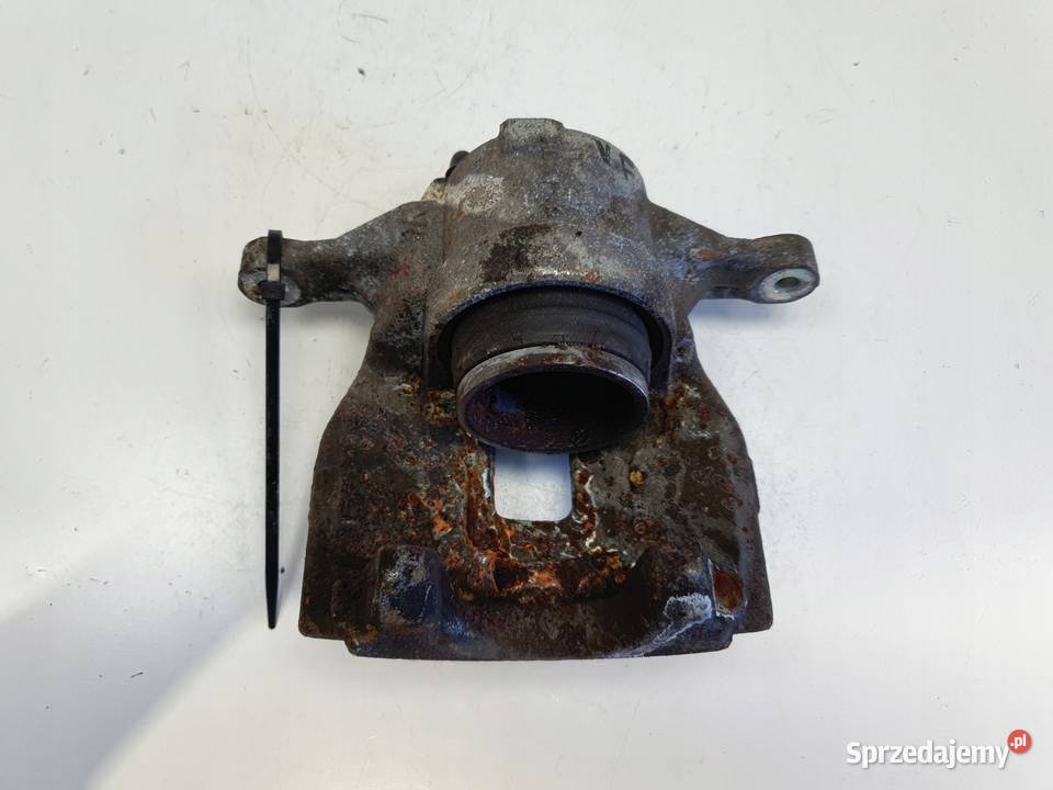 Toyota Corolla XII E21 PRZEDNI ZACISK HAMULCOWY Rudka