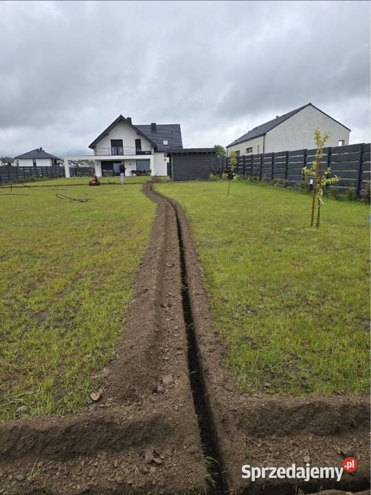 Wykop liniowy koparka łańcuchową pod nawodnienie Polska Nowa Wieś usługi budowlane