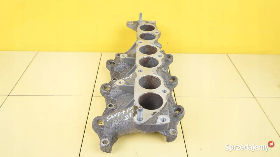 SANTA FE II CARNIVAL 27 V6 08r G6EA kolektor Suków