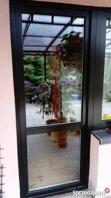 Drzwi balkonowe 2340 x 910 firmy TRAS stan PCV