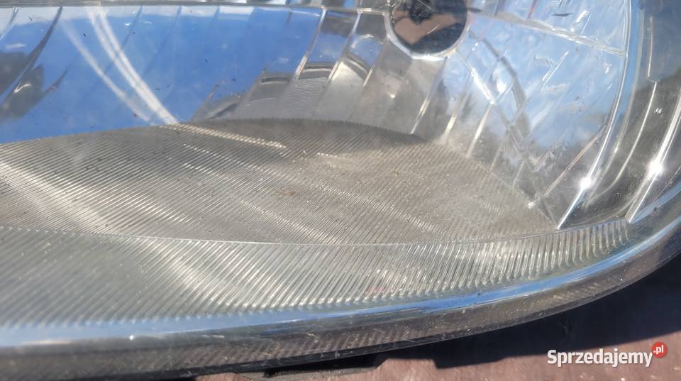 Skoda Fabia II LAMPA LEWA PRZÓD REFLEKTOR 1663